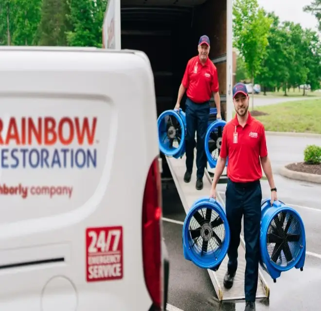 Rainbow Restoration specialist arriving for water damage services.